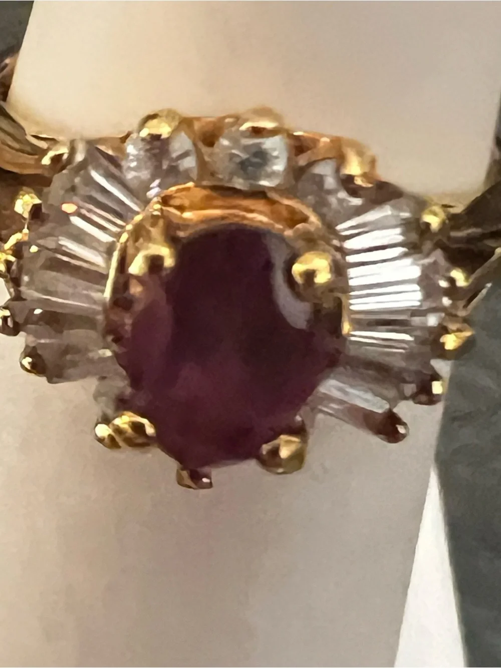 Gold Ring with Ruby-Red Center and Clear Accent Stones